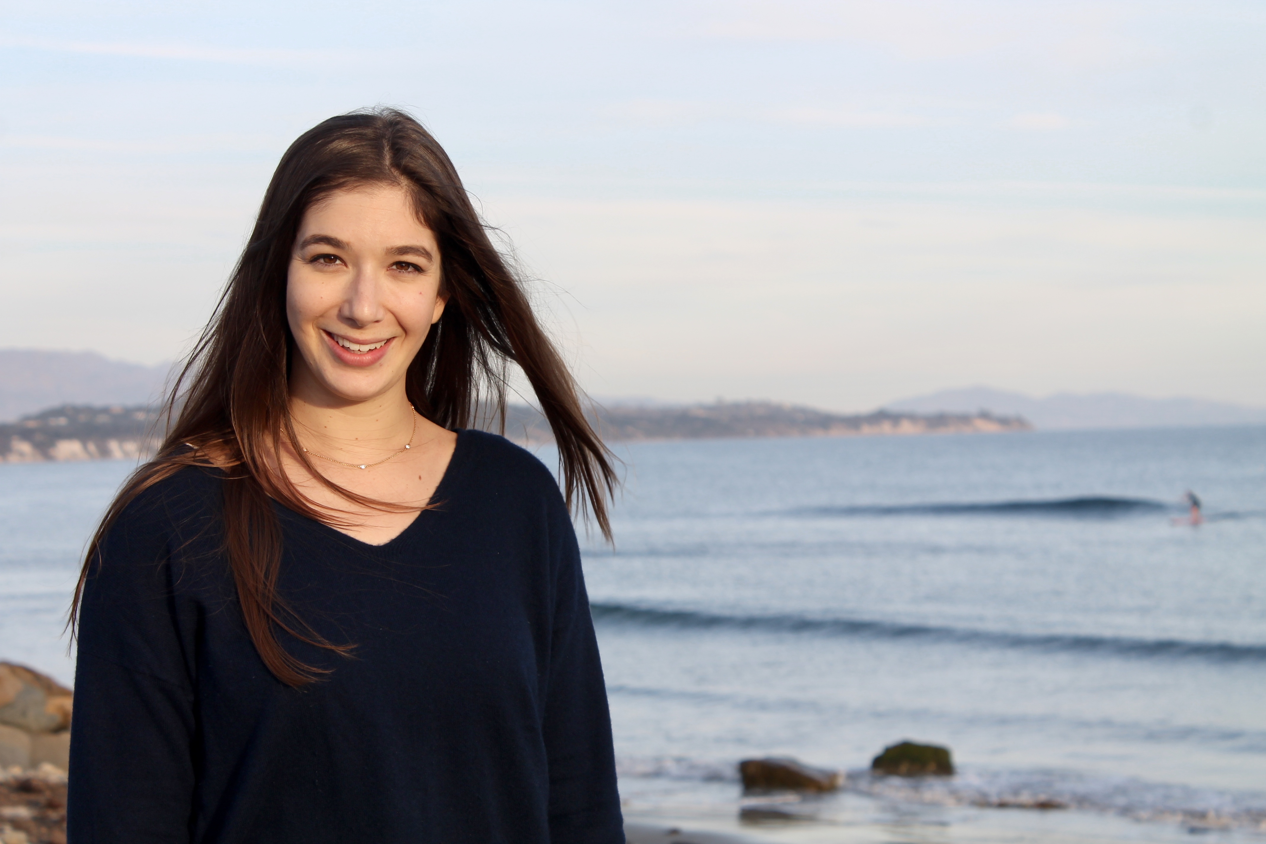 Alexa Fredston-Hermann stands on a beach