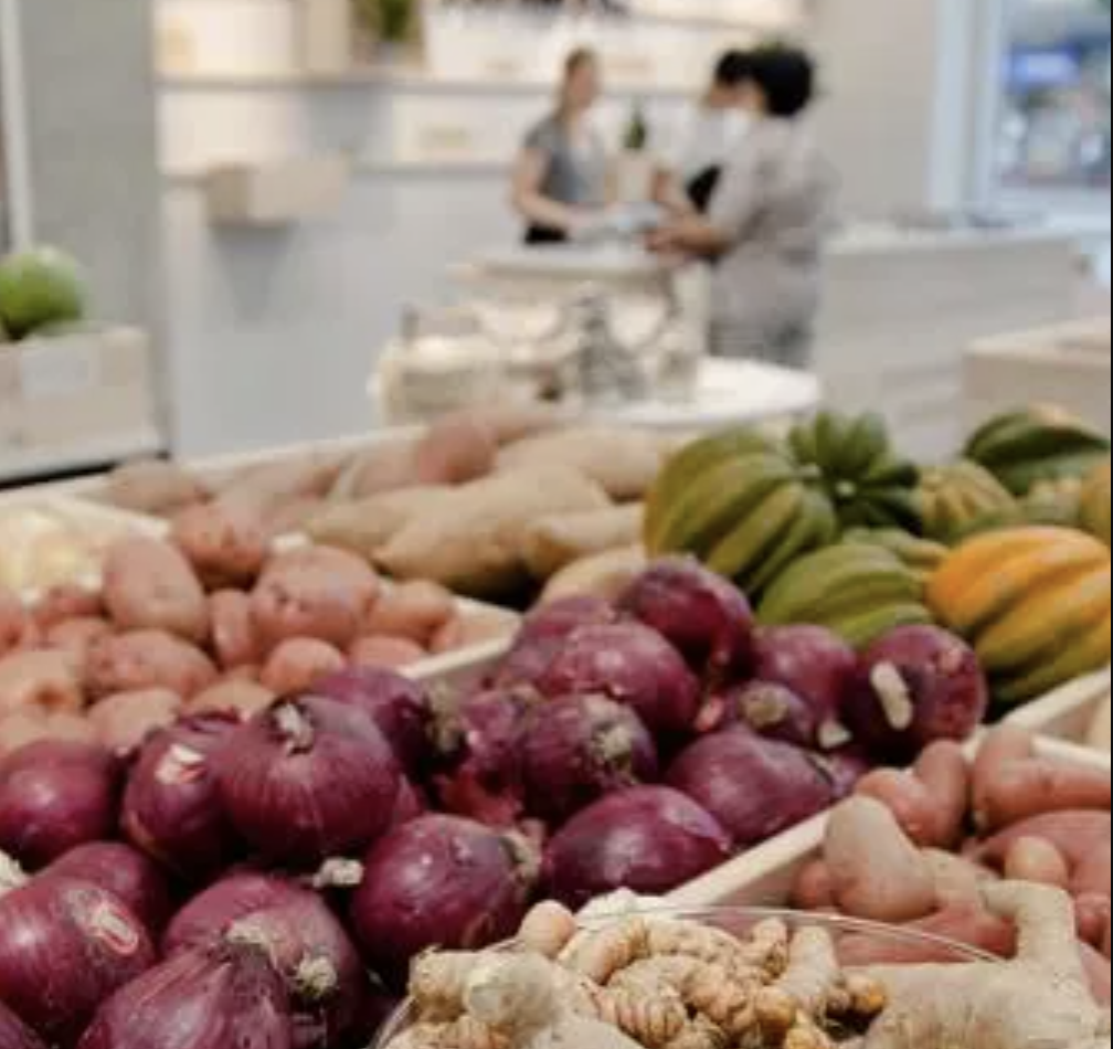 vegetables in bins in a store