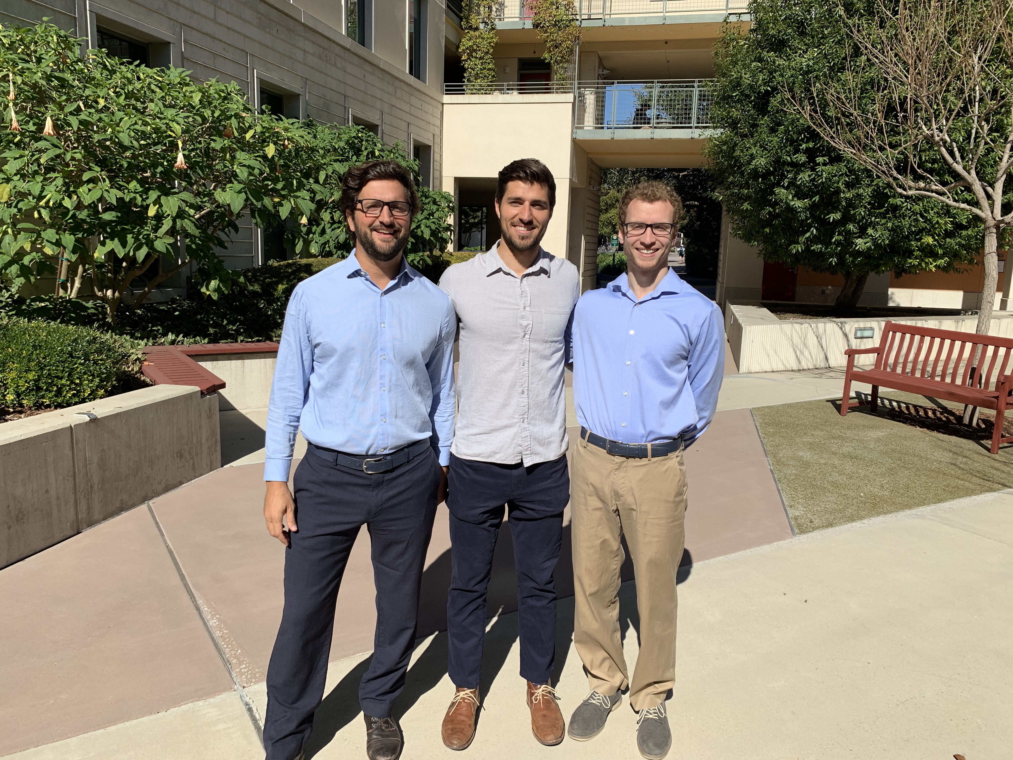 Three students standing together