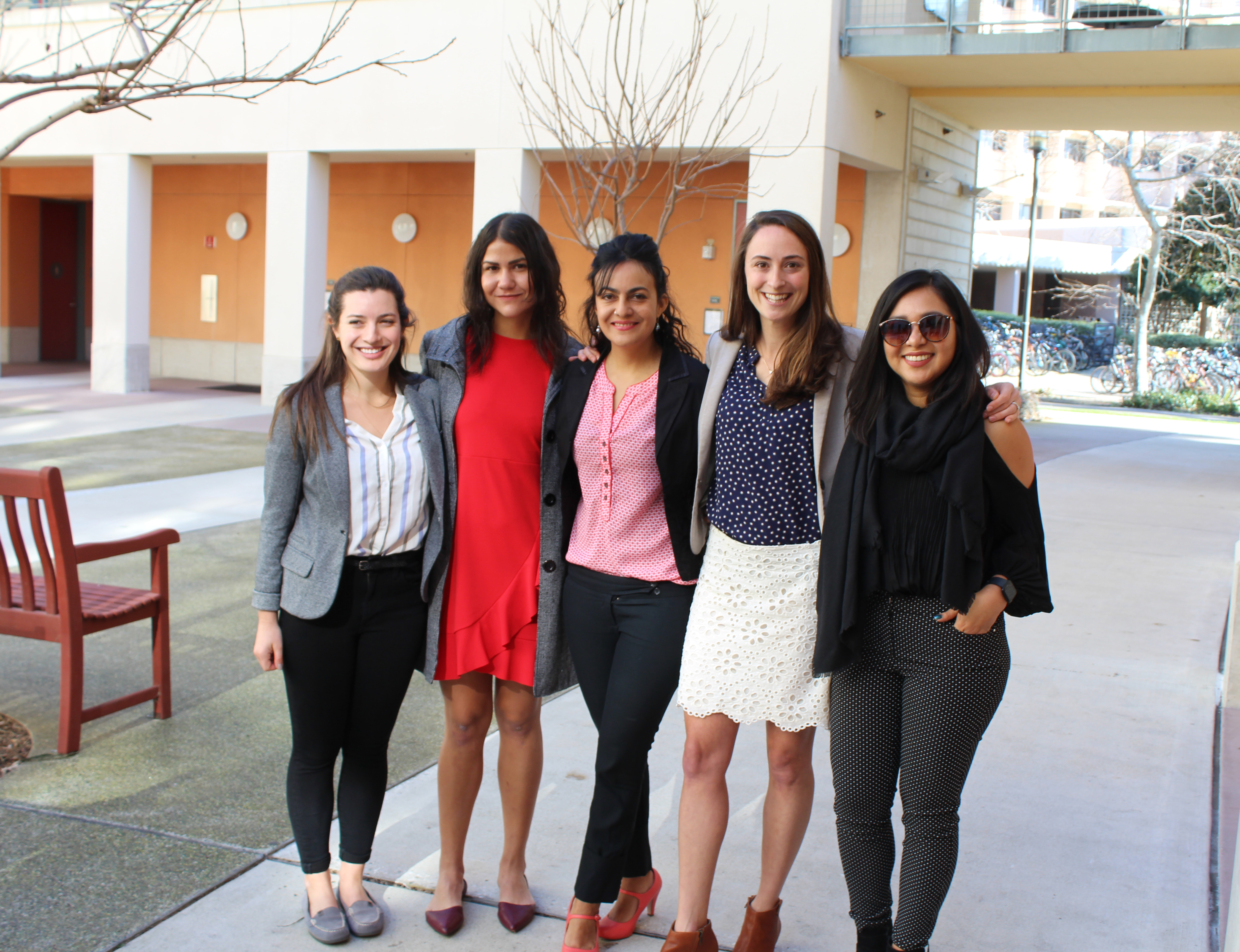 Five female students standing together for a photo