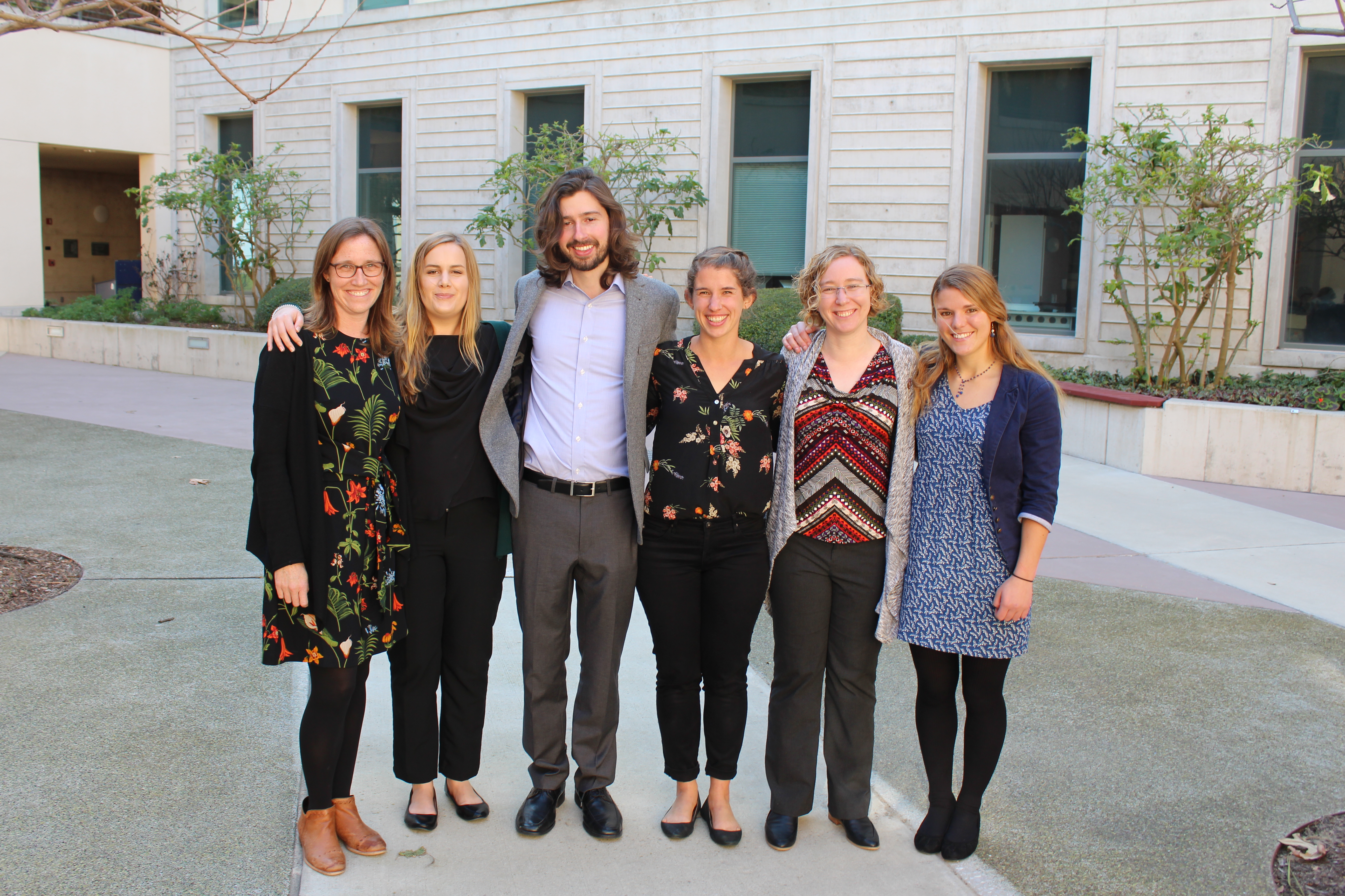 Five students posing with their project mentor