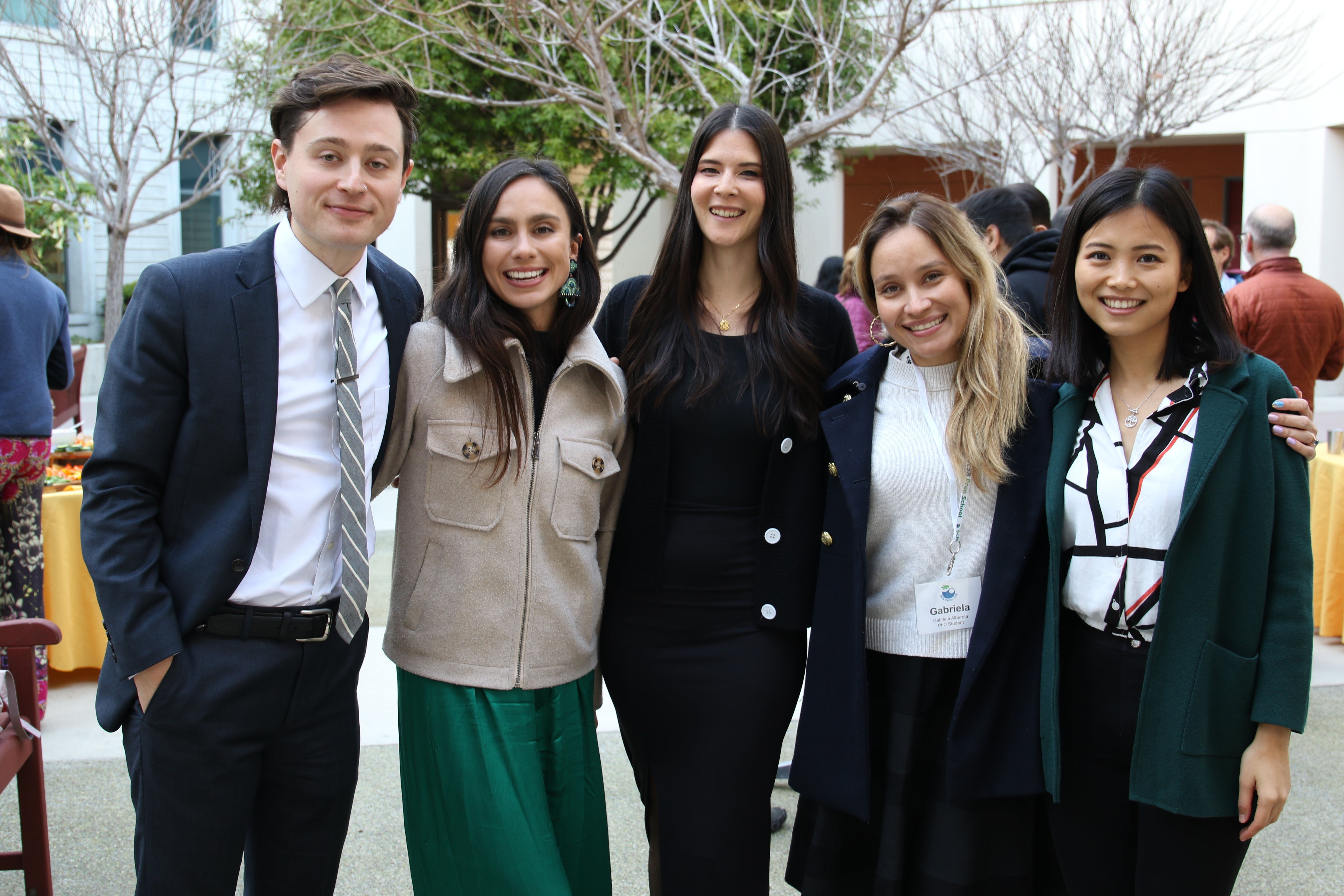 PhD students pose for a group photo