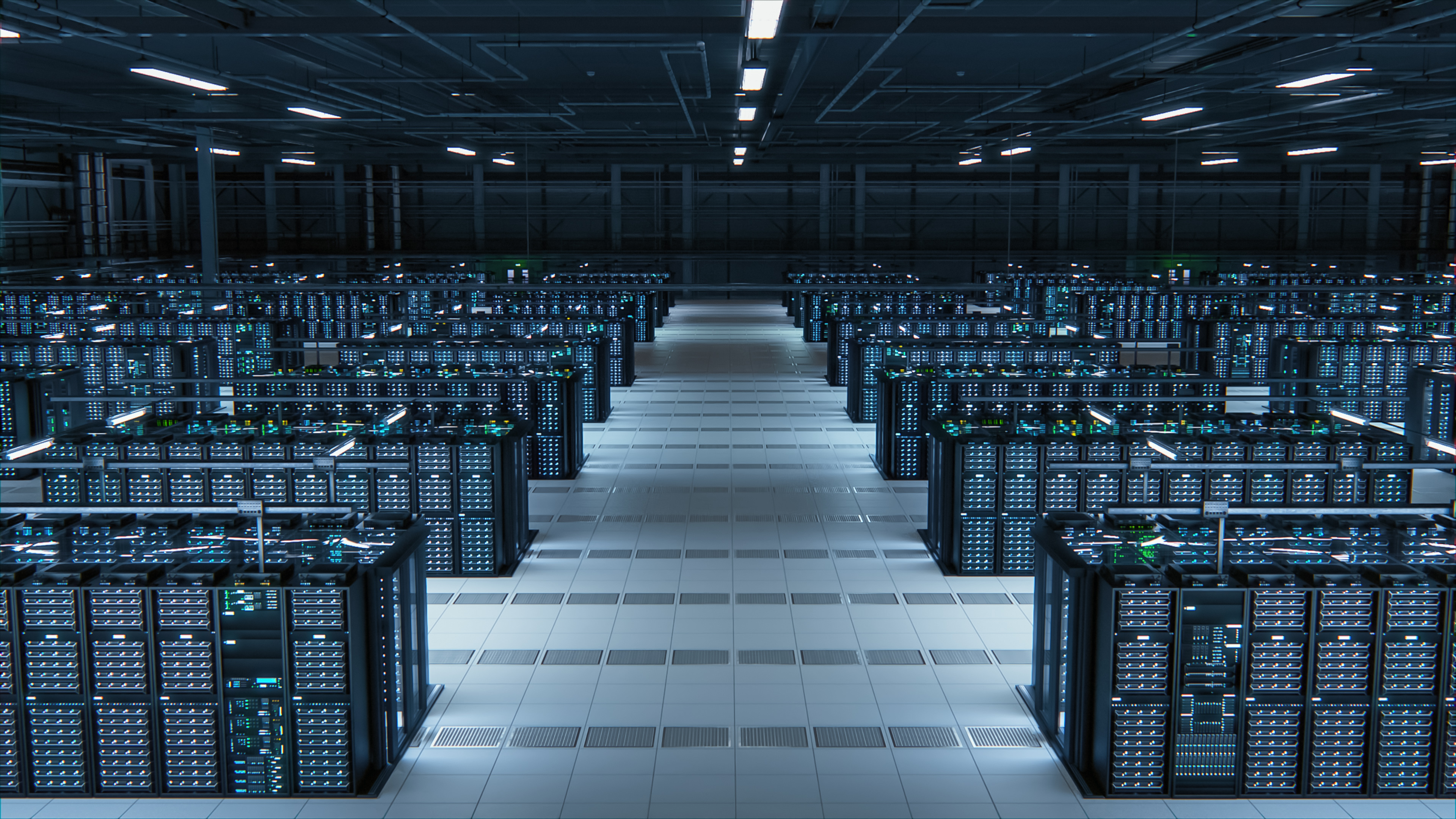 Many computer servers in a dark room in a data center 