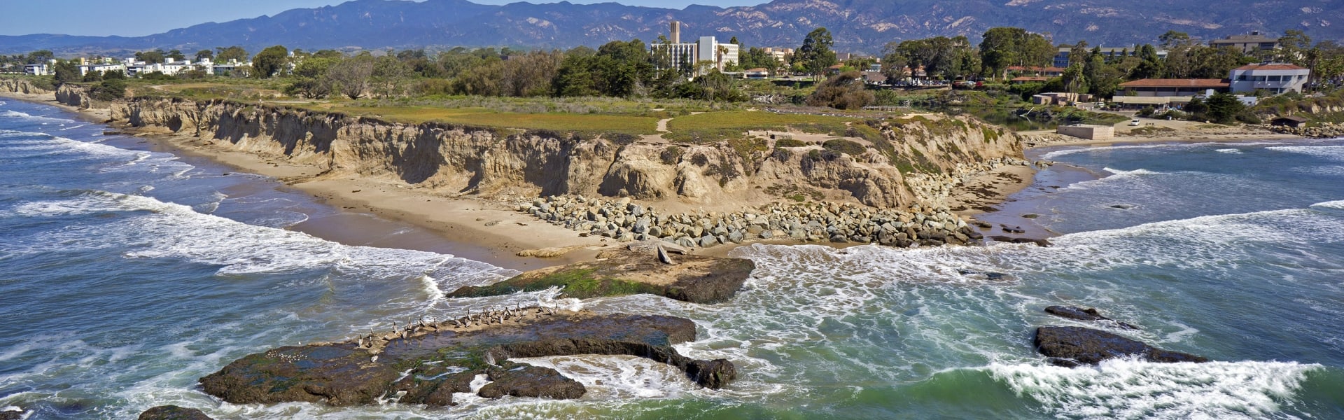 aerial view of waves on a shore