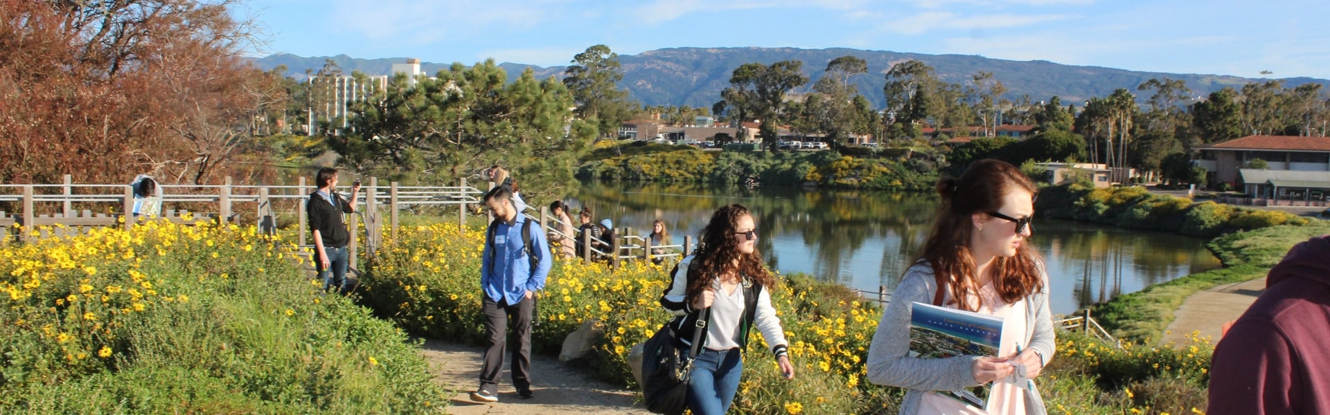 People walking on a tour of beach bluffs