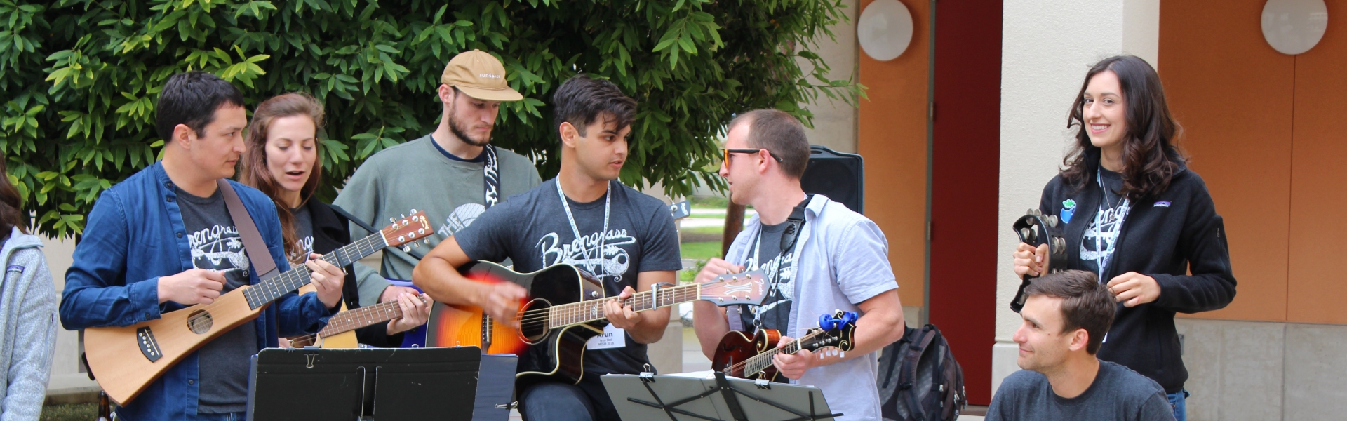 Several people playing instruments in band performance