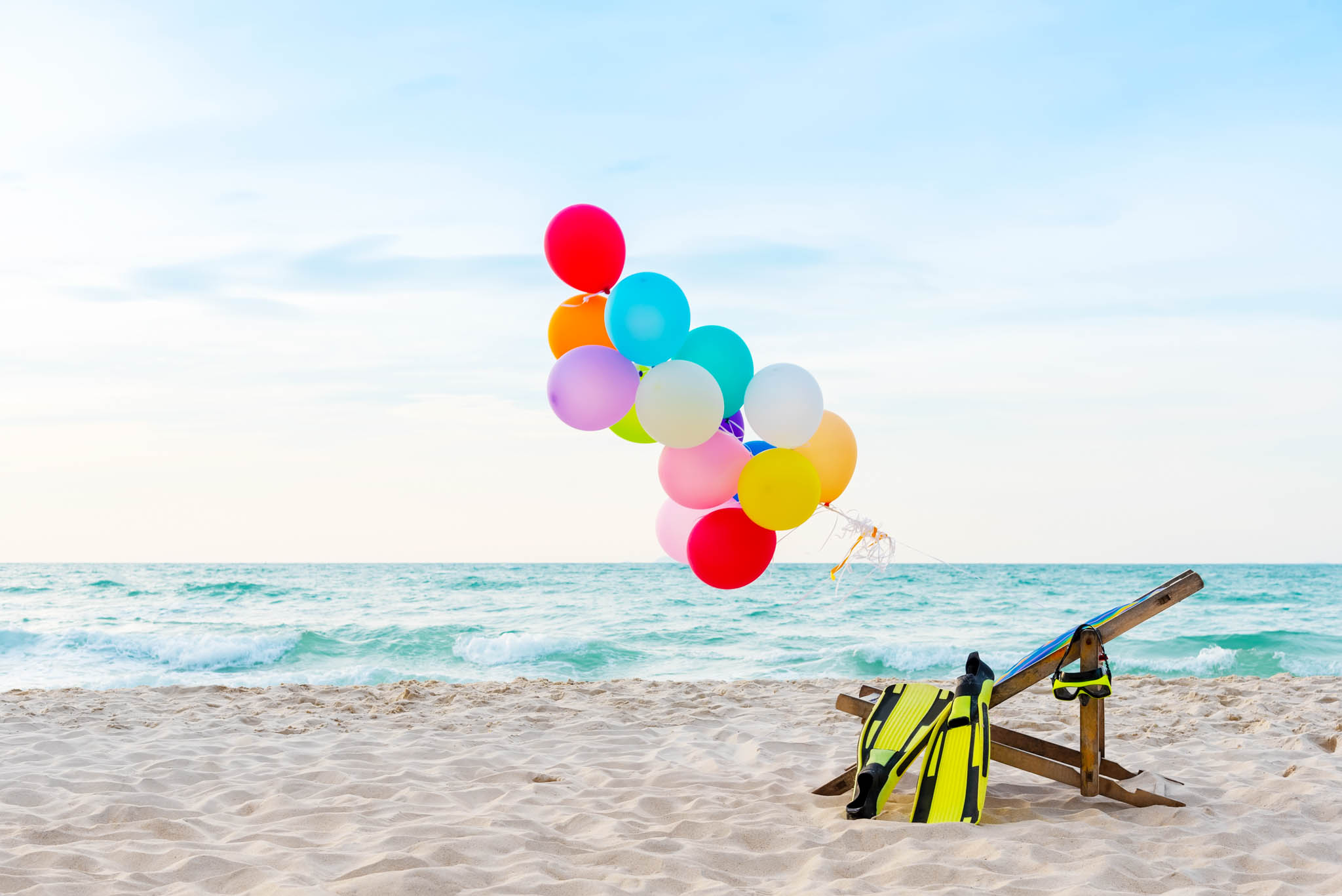 Balloons by ocean