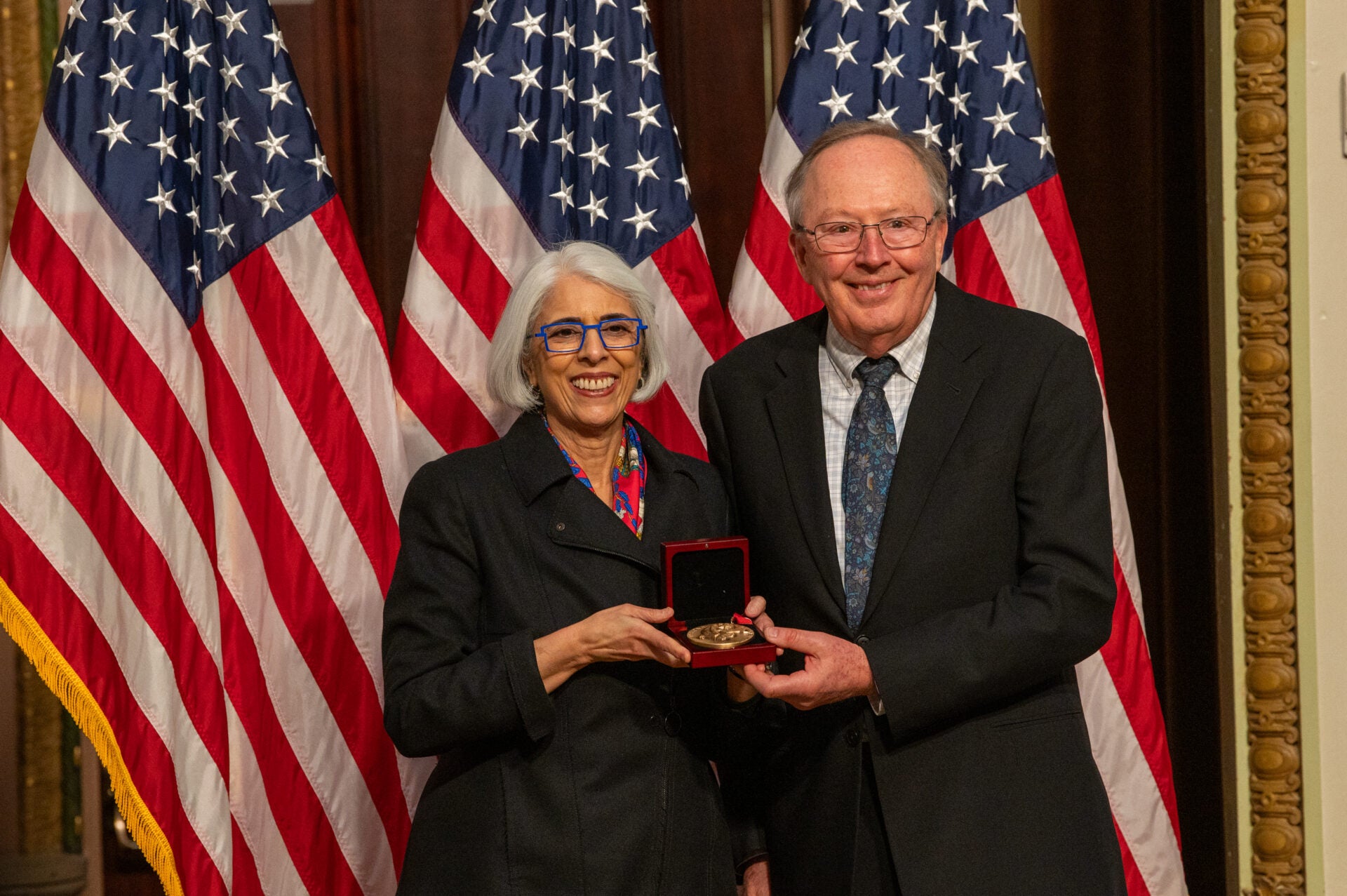 Arati Prabhakar, Ph.D., Director of the White House Office of Science and Technology Policy (OSTP), awards G. David Tilman the National Medal of Science