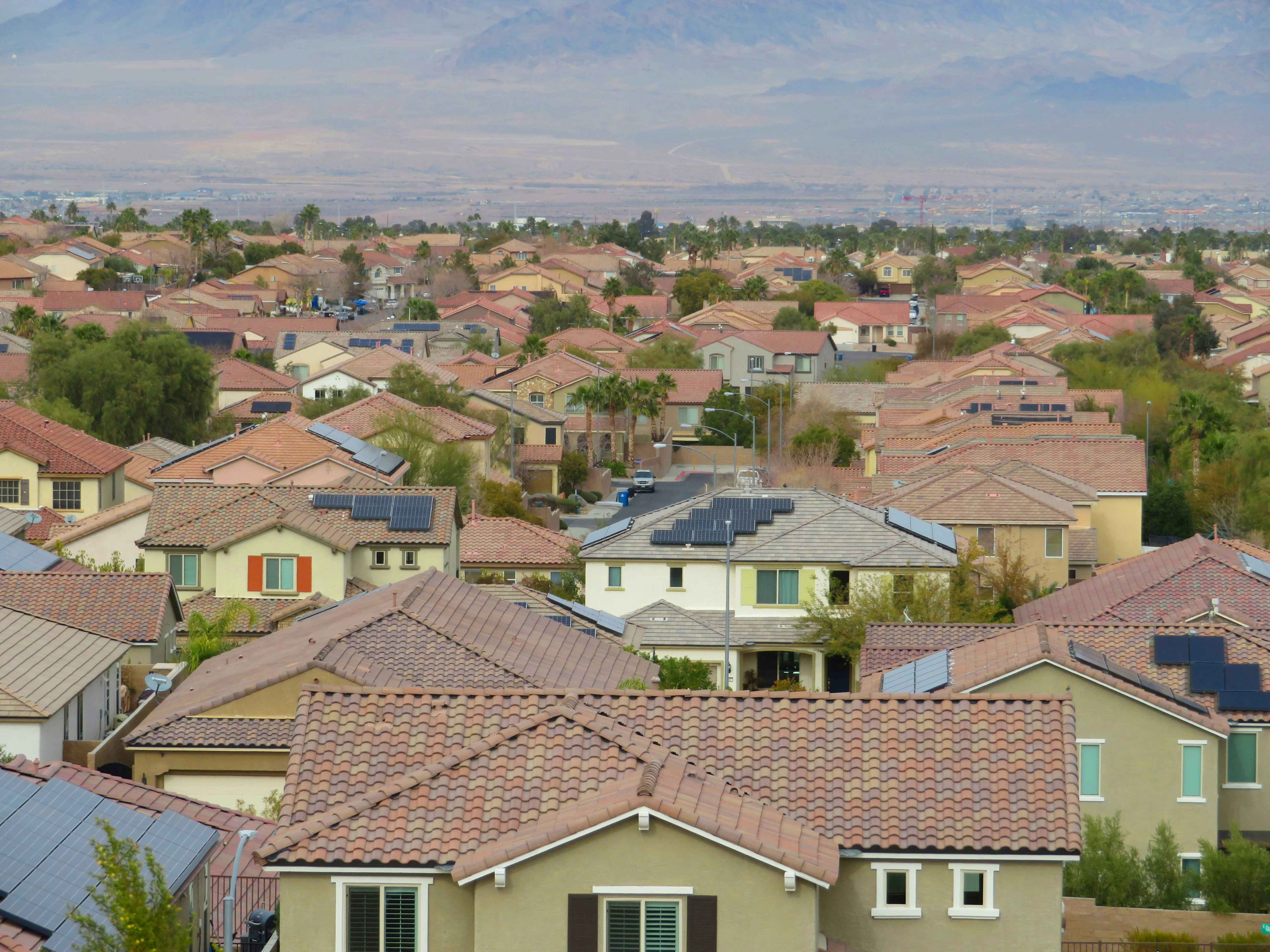 houses with solar panels on them