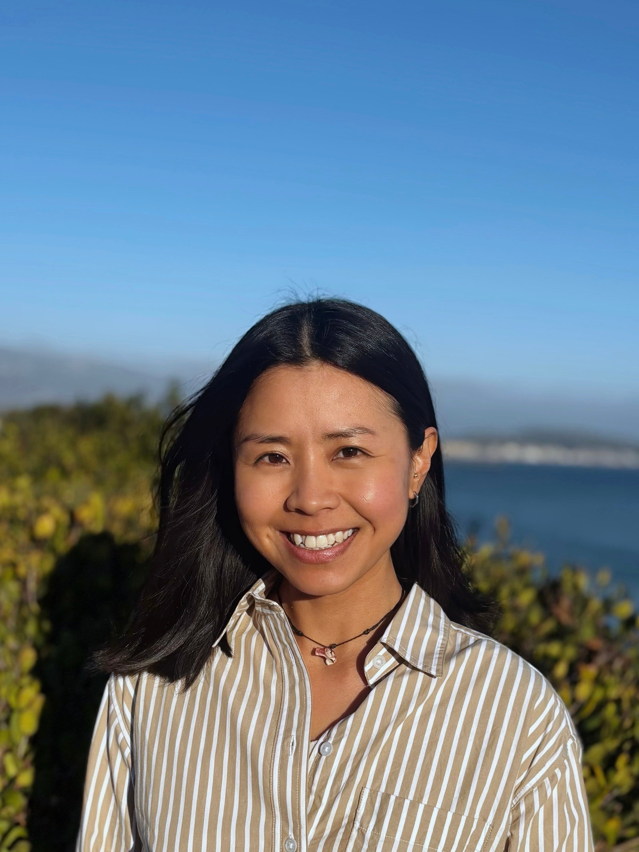Headshot of Sandy Sum