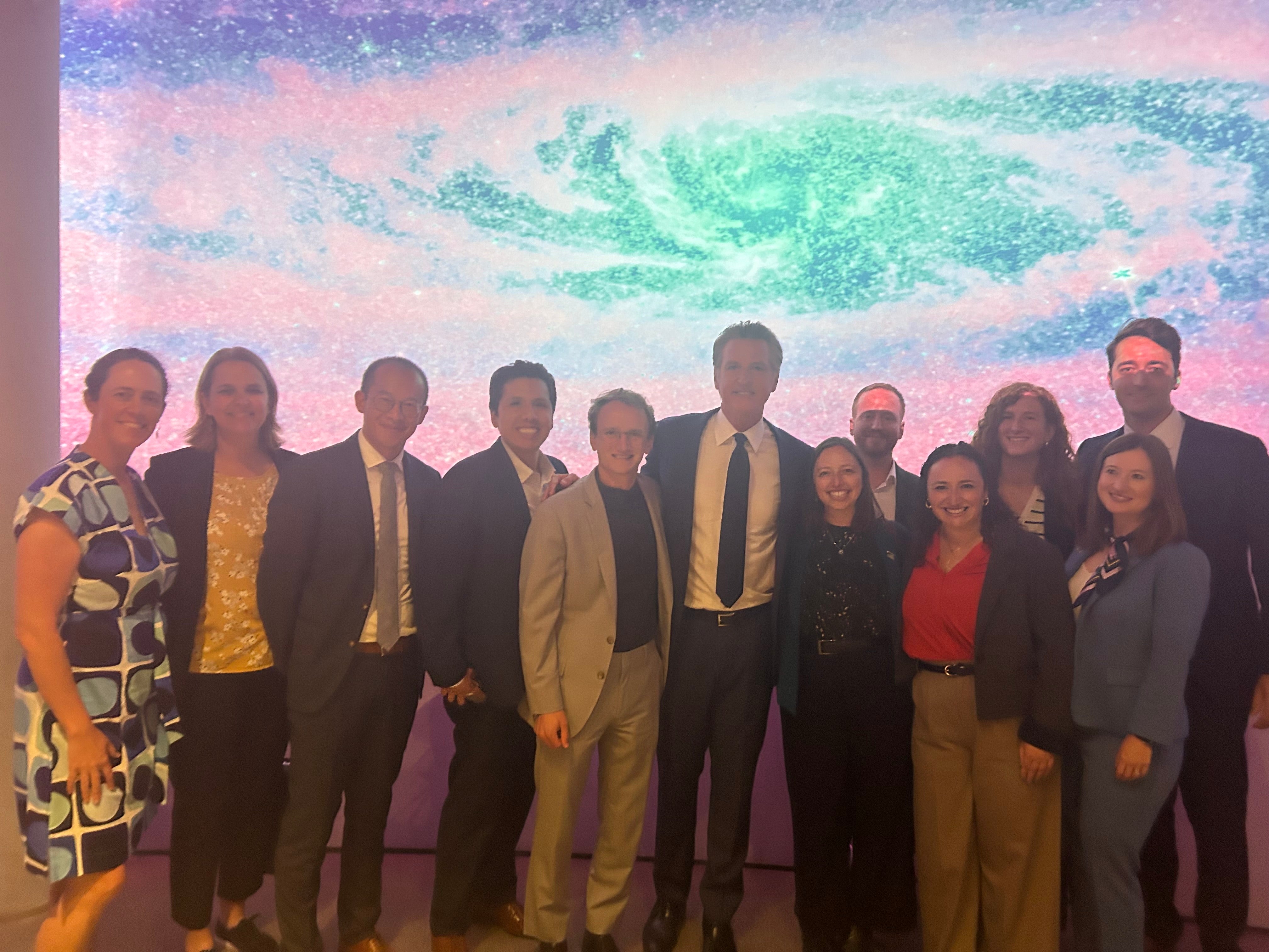 A photo of Kyle Meng and Gov. Gavin Newsome following the passing of new legislation.