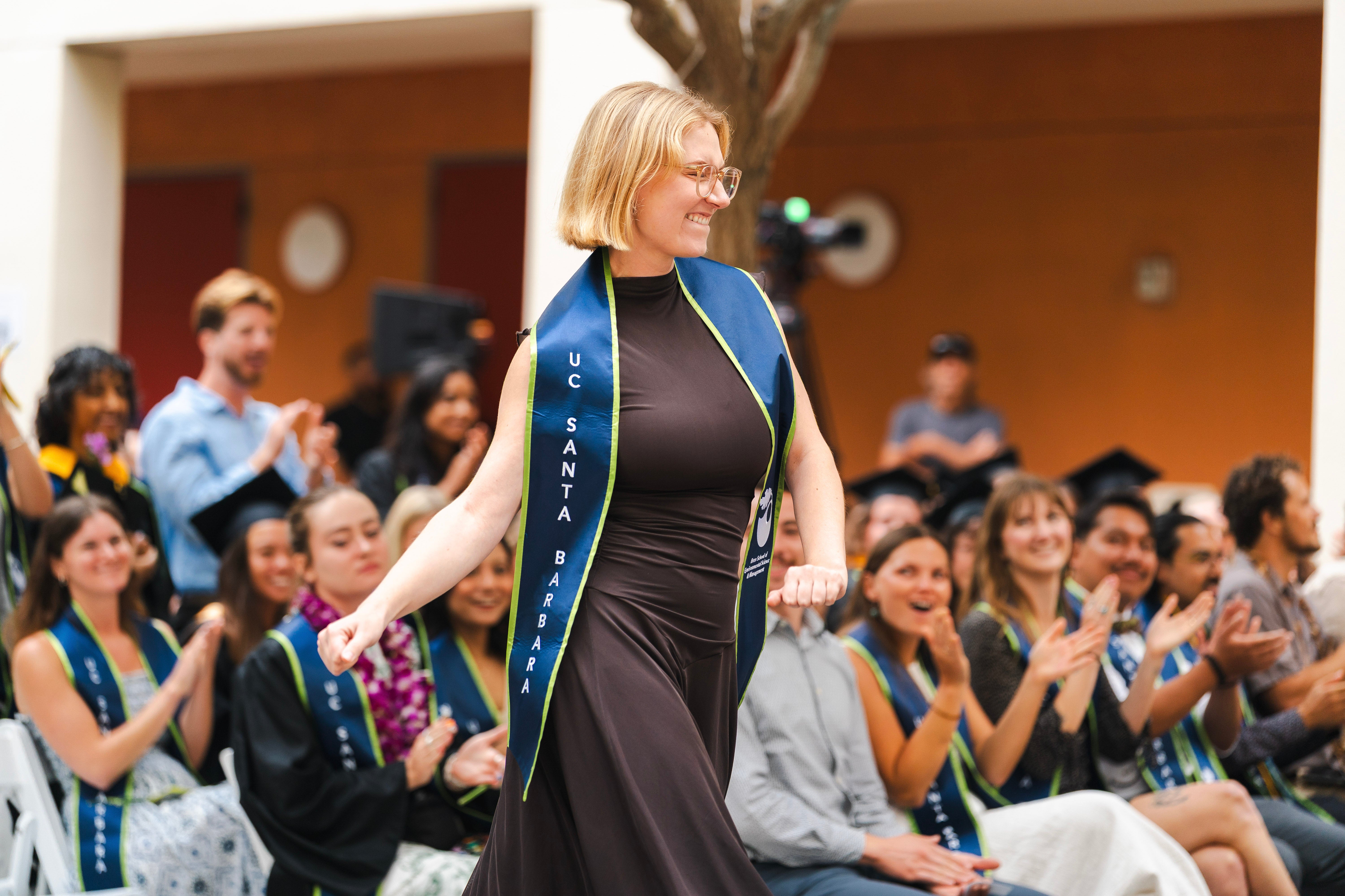 Rosanna Xia addresses Bren School graduates from the lectern