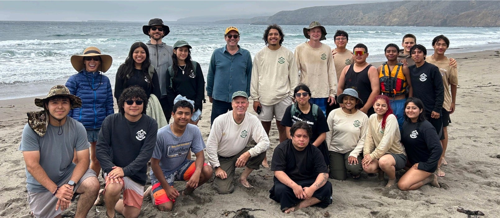 conservation corps on the beach
