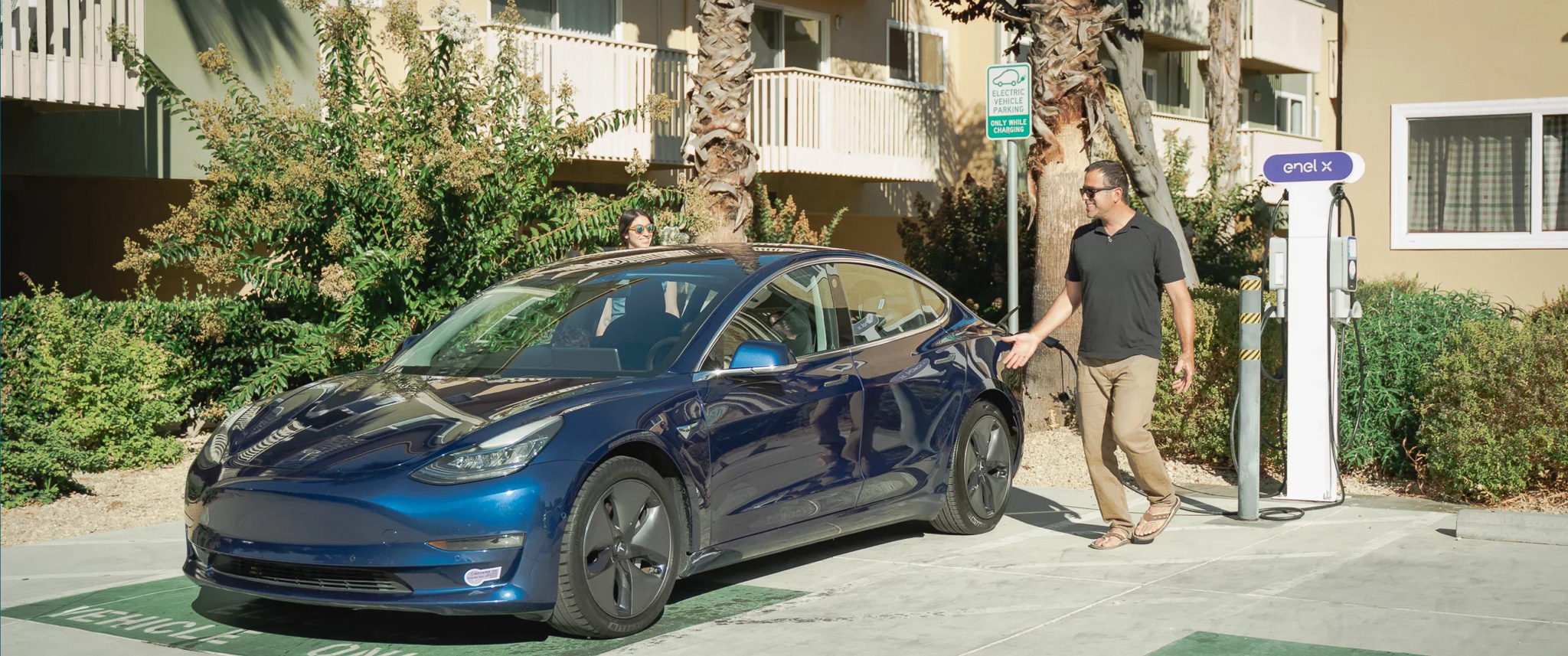 People enter a fully charged electric vehicle