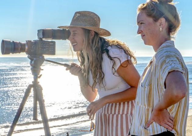 Students shooting a film on the beach