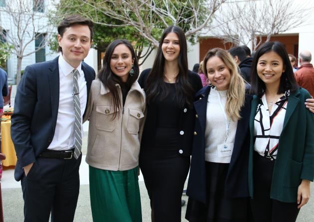 PhD students pose for a group photo