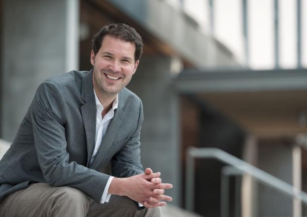 Frederik Noack sits on steps outside