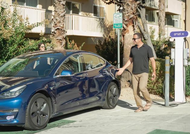 People enter a fully charged electric vehicle