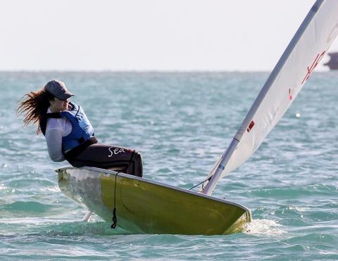 Woman on sailboat on the sea