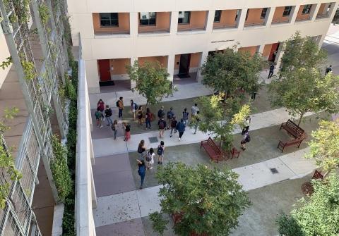 Distant view of students around Bren Hall