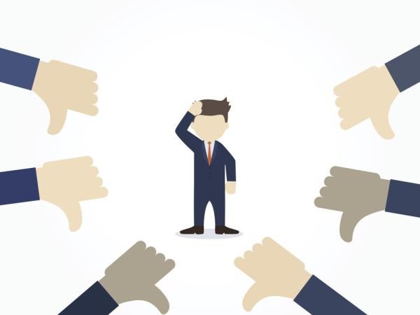 graphic of confused man surrounded by hands giving thumbs-down gestures