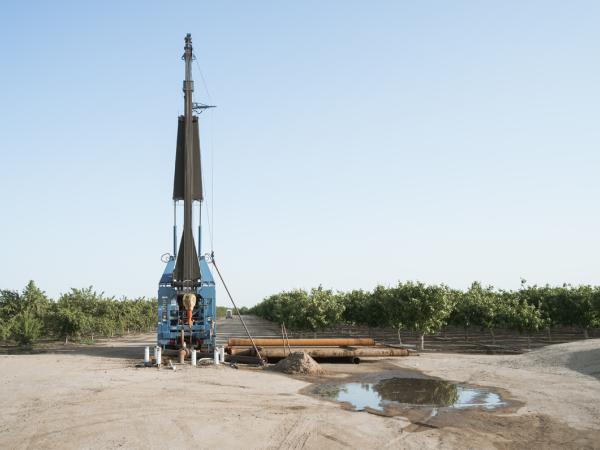 Groundwater drilling equipment in a field