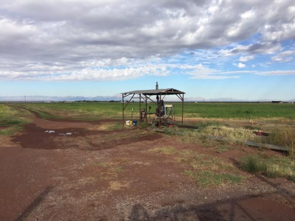 A groundwater well in a field