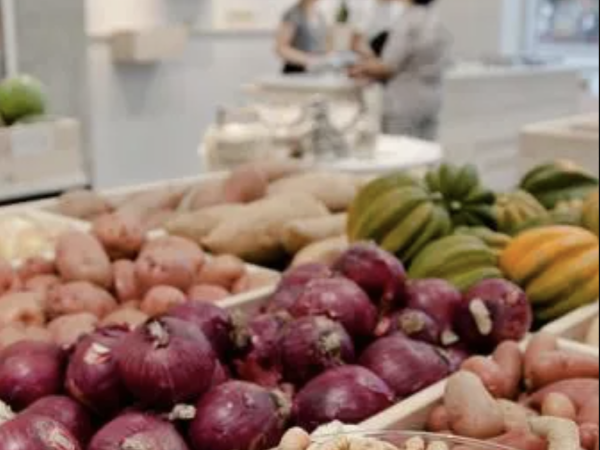 vegetables in bins in a store