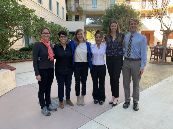 Five students and faculty mentors posing for a photo