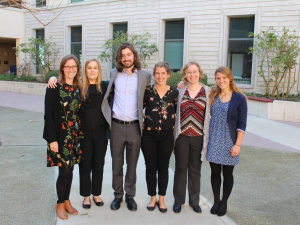 Five students posing with their project mentor