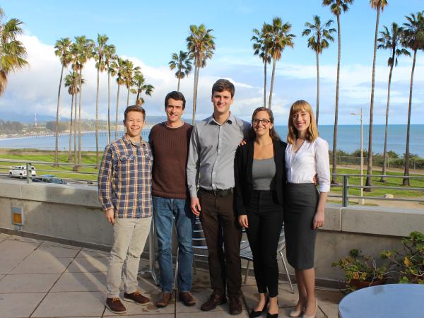 Group of five students posing together