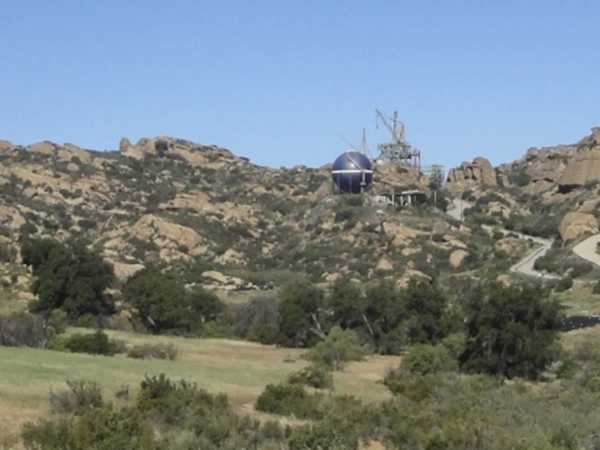 Building sitting in rocky foothills