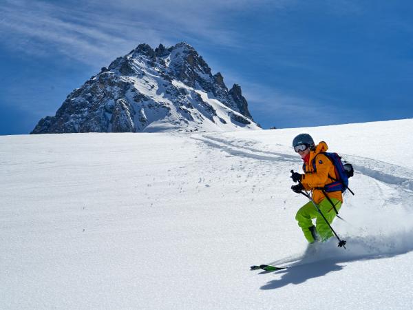 Skier on snowy mountainside