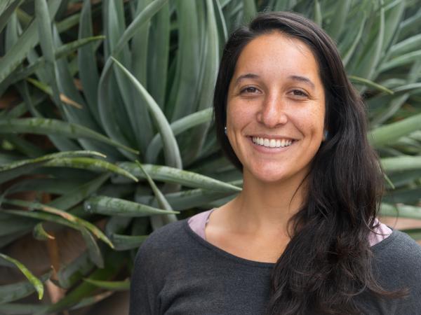Portrait of woman by plants