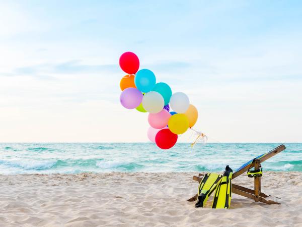 Balloons by ocean
